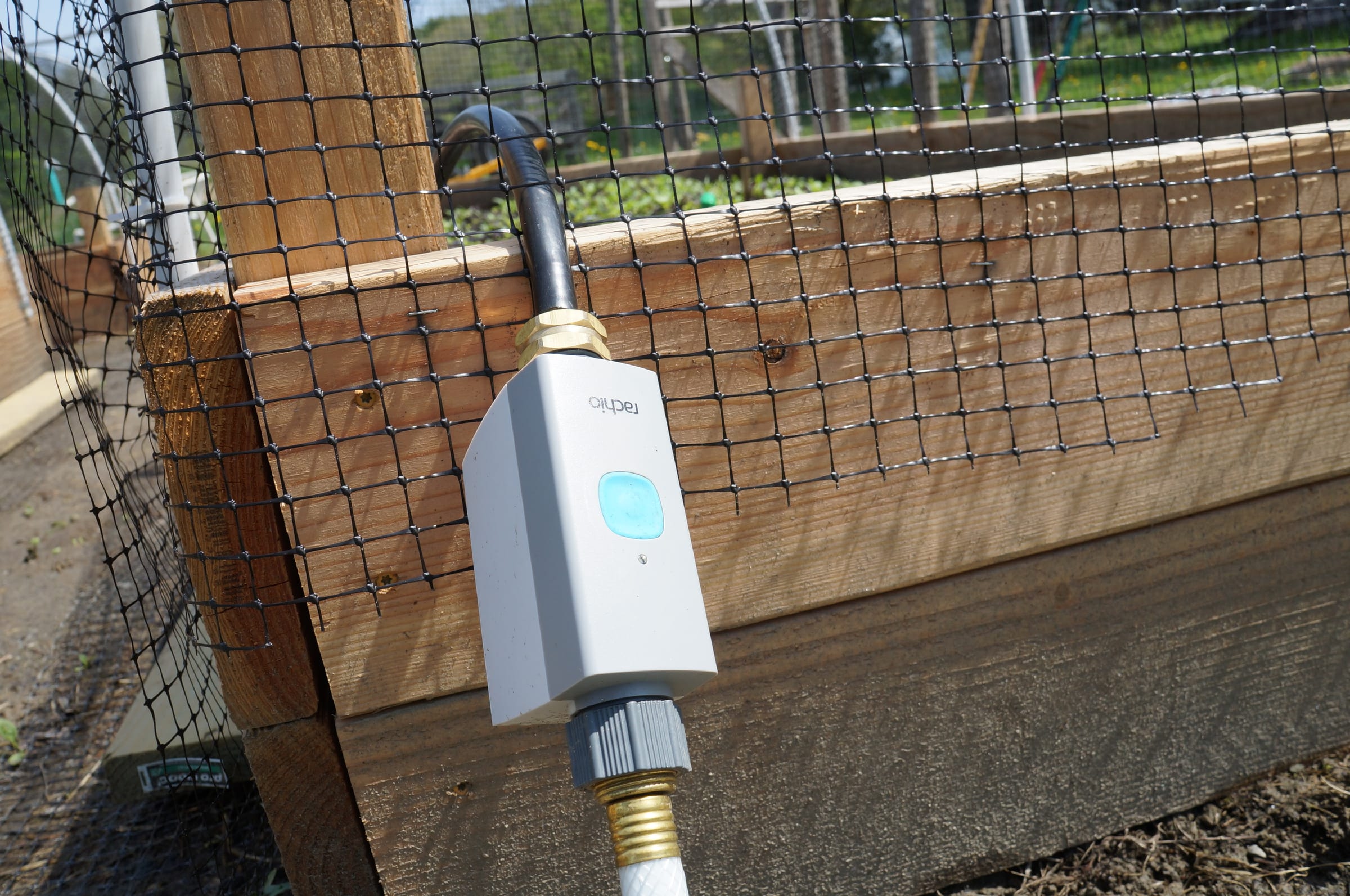 A Rachio smart hose valve at the beds — Garzed opens and closes it from the soil reading.